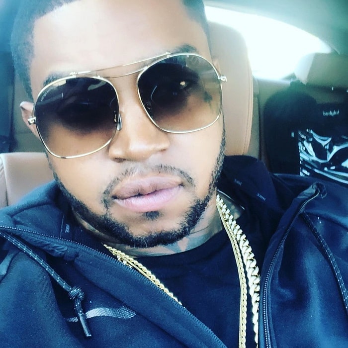 Lil Scrappy taking a selfie from inside his car.
